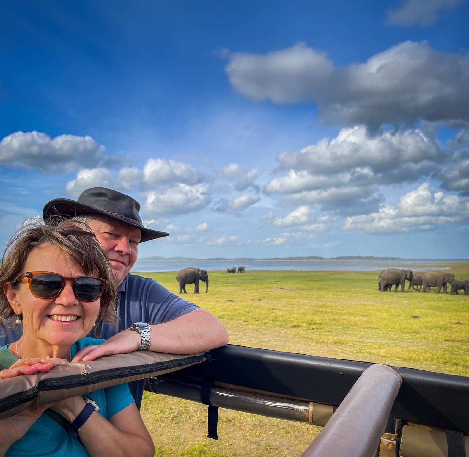 Joyful family creating lasting memories during elephant safari at Kaudulla National Park